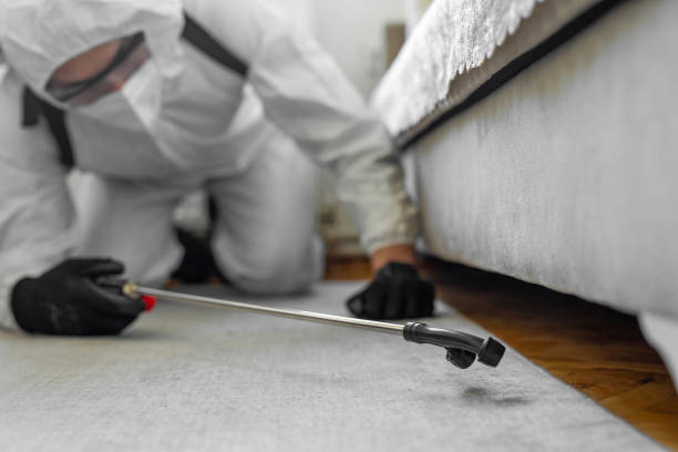 Professional Emergency Pest Control technician working in Sandersville, GA